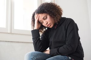 a woman suffering from mental health disorders