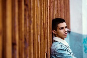 young man wonders about relapse prevention