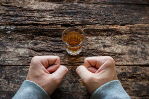 individual struggling to end his alcohol dependence