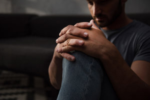 man struggling with cocaine withdrawal symptoms