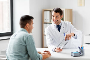 Doctor talks to patient about rational emotive behavioral therapy