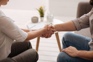 Two people shake hands at addiction treatment centers in Boise ID