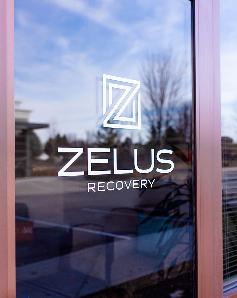 Zelus Recovery logo on a door in Boise, ID