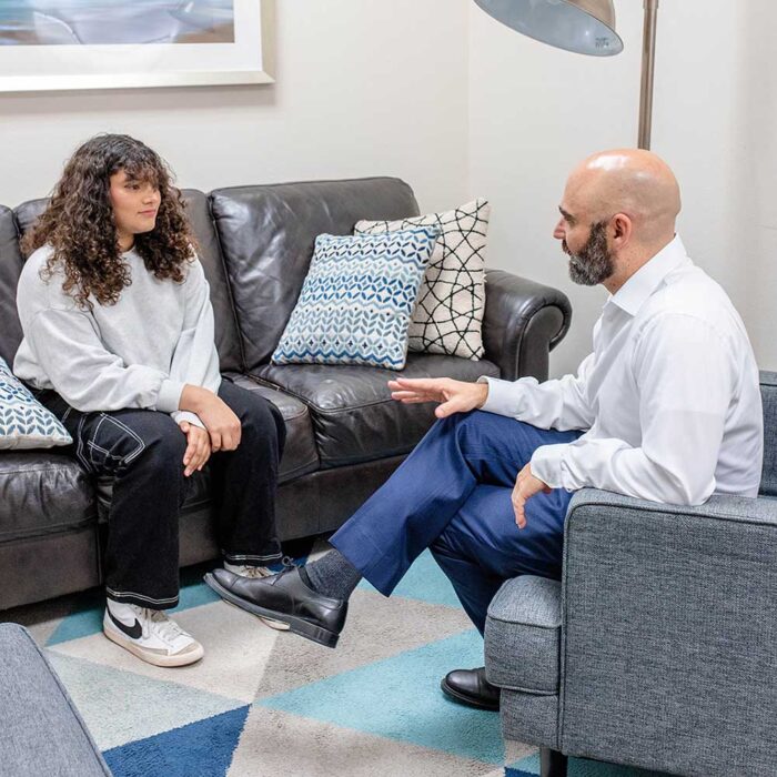 Adolescent female speaking with a therapist at Zelus Recovery in Boise, ID