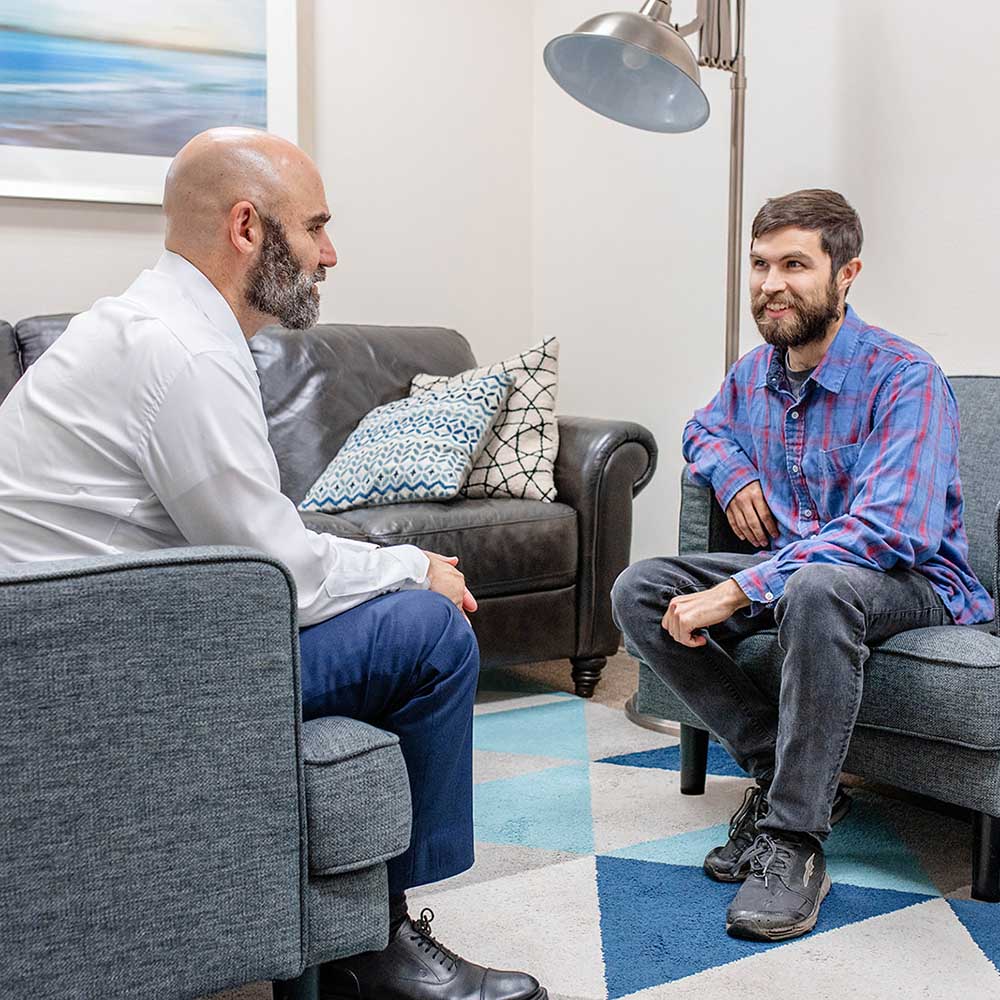 Two men in a therapy session
