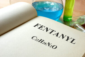 Person looks and book and wonders, s fentanyl an opioid