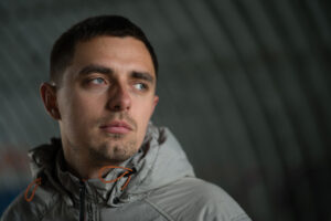 Man signs as he considers heroin withdrawal symptoms