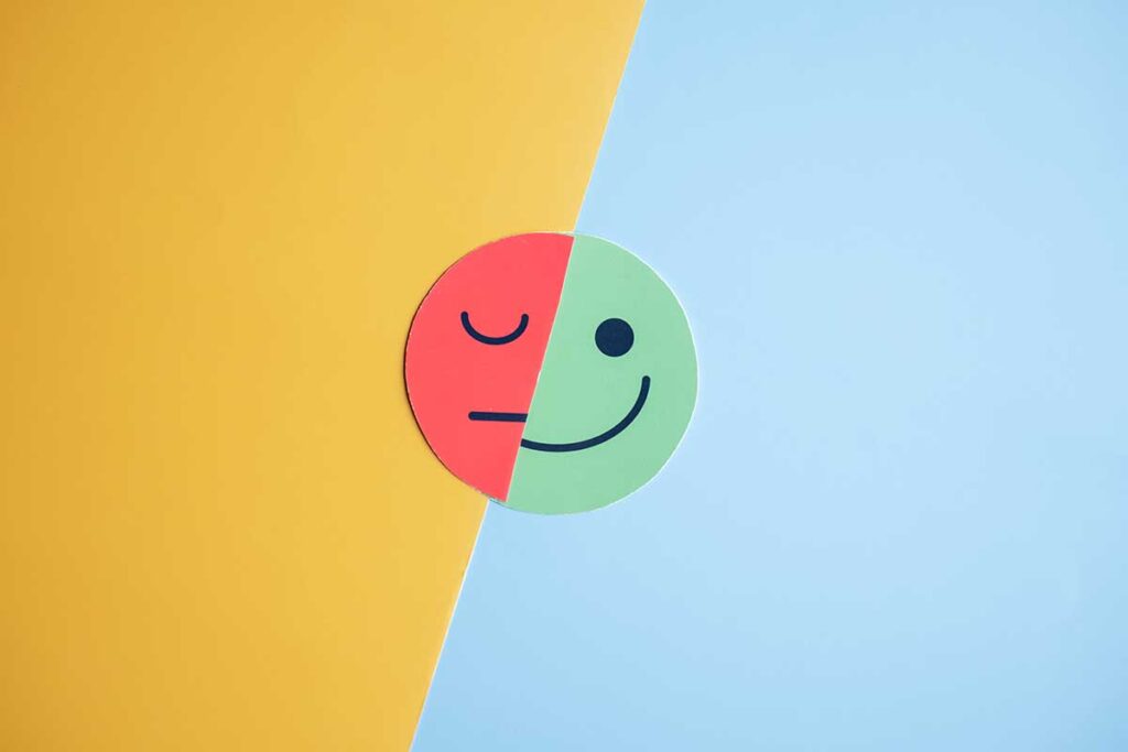 Smiley face that is half anxious
