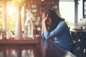 Woman overlooking Boise while reflecting on her relationship with alcohol.